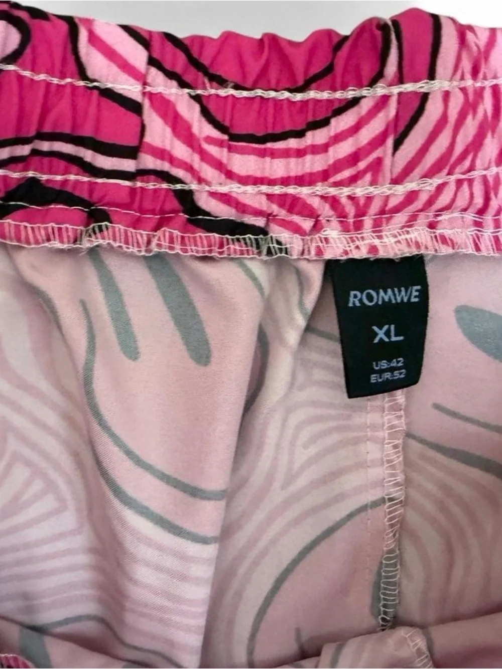 ROMWE  men’s Pink graphic swim trunks size XL